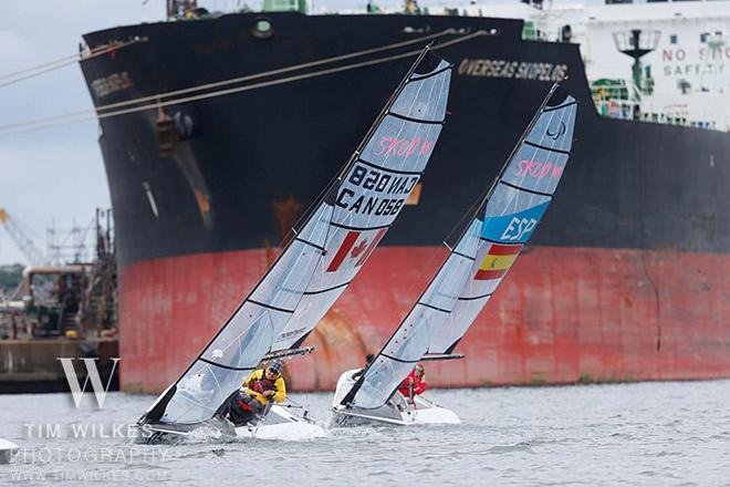 Canada and Spain SKUD teams with a container ship in the background - 2014 IFDS World Championship © Tim Wilkes
